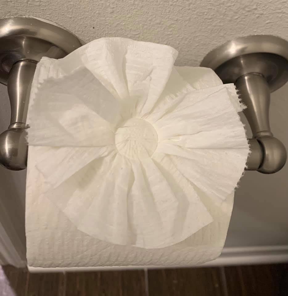 Decorative toilet paper rosette — our signature touch